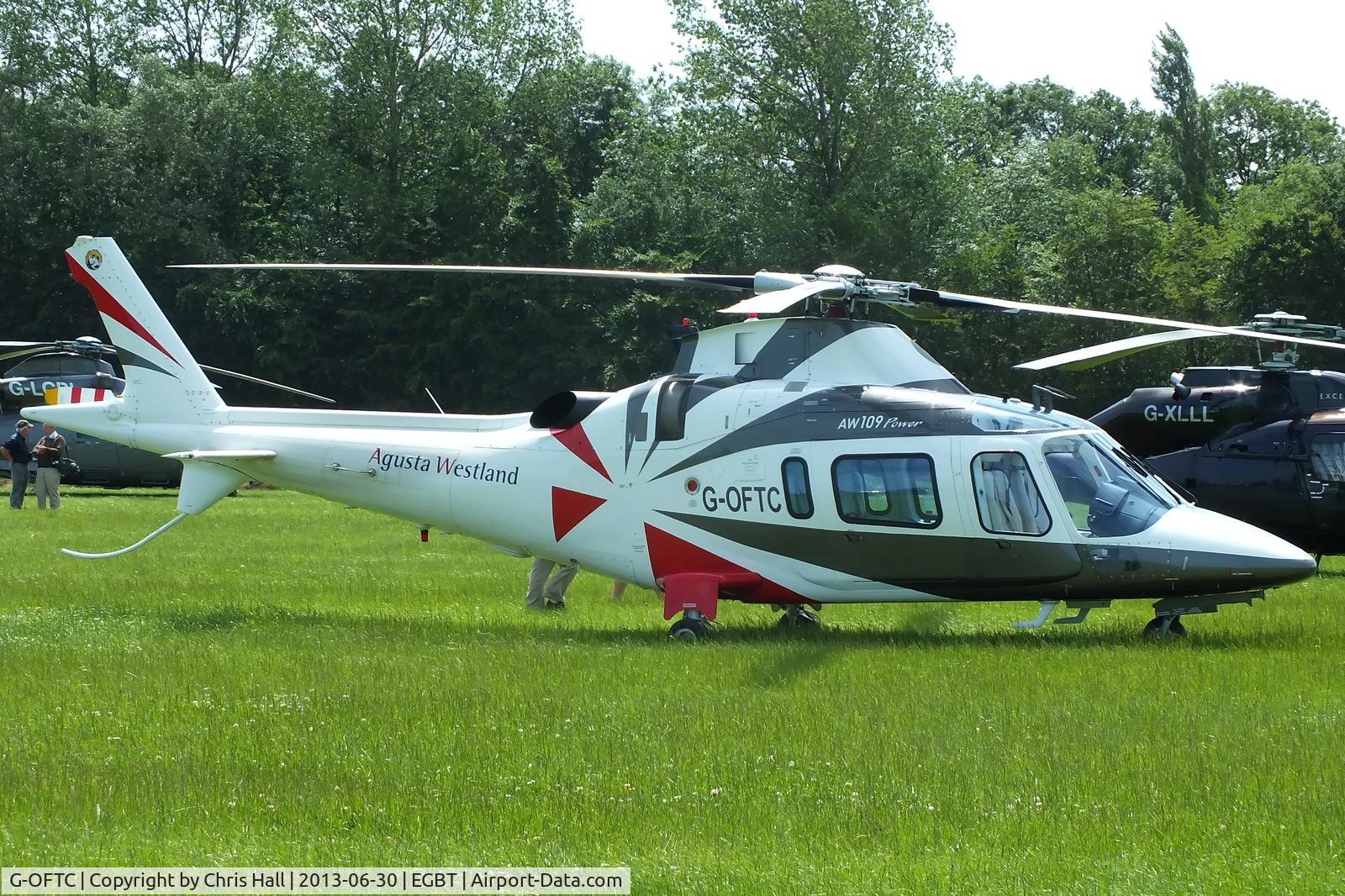 G-OFTC, 1999 Agusta A-109E Power C/N 11043, being used for ferrying race fans to the British F1 Grand Prix at Silverstone