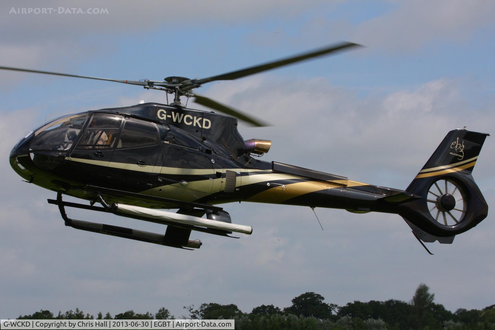 G-WCKD, 2009 Eurocopter EC-130B-4 (AS-350B-4) C/N 4746, being used for ferrying race fans to the British F1 Grand Prix at Silverstone