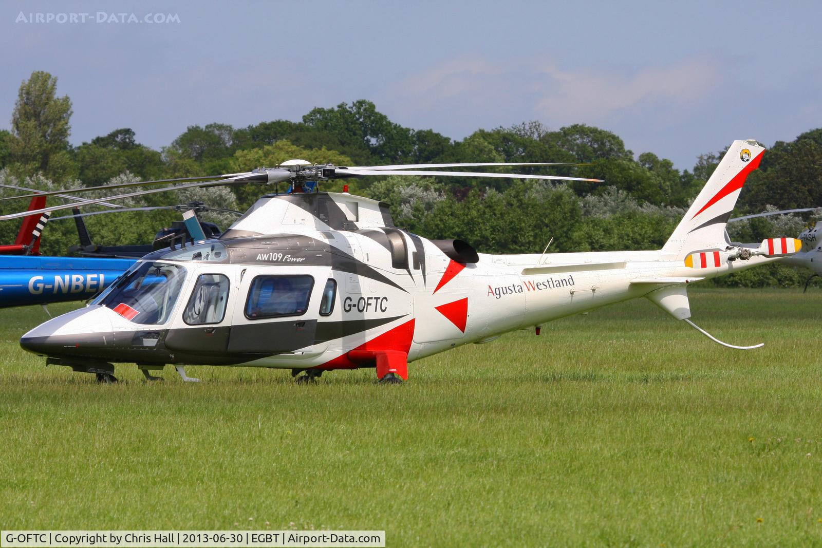G-OFTC, 1999 Agusta A-109E Power C/N 11043, being used for ferrying race fans to the British F1 Grand Prix at Silverstone