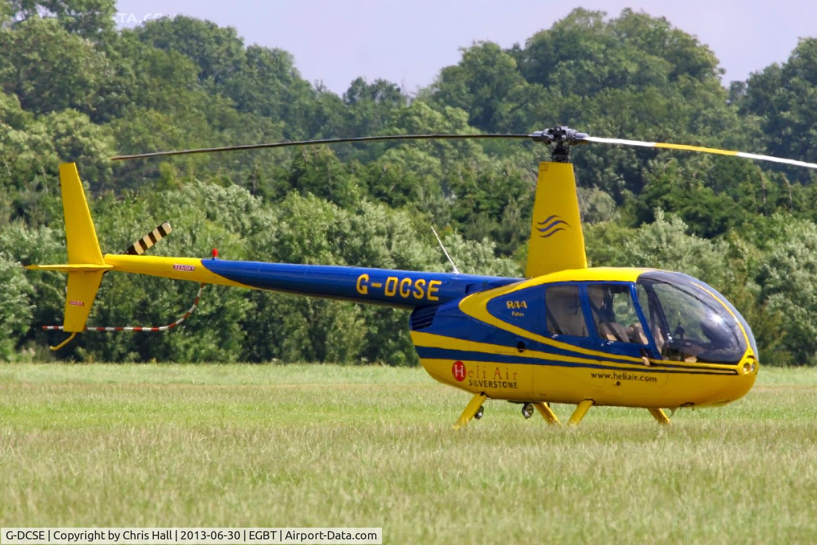 G-DCSE, 1999 Robinson R44 Astro C/N 0659, being used for ferrying race fans to the British F1 Grand Prix at Silverstone