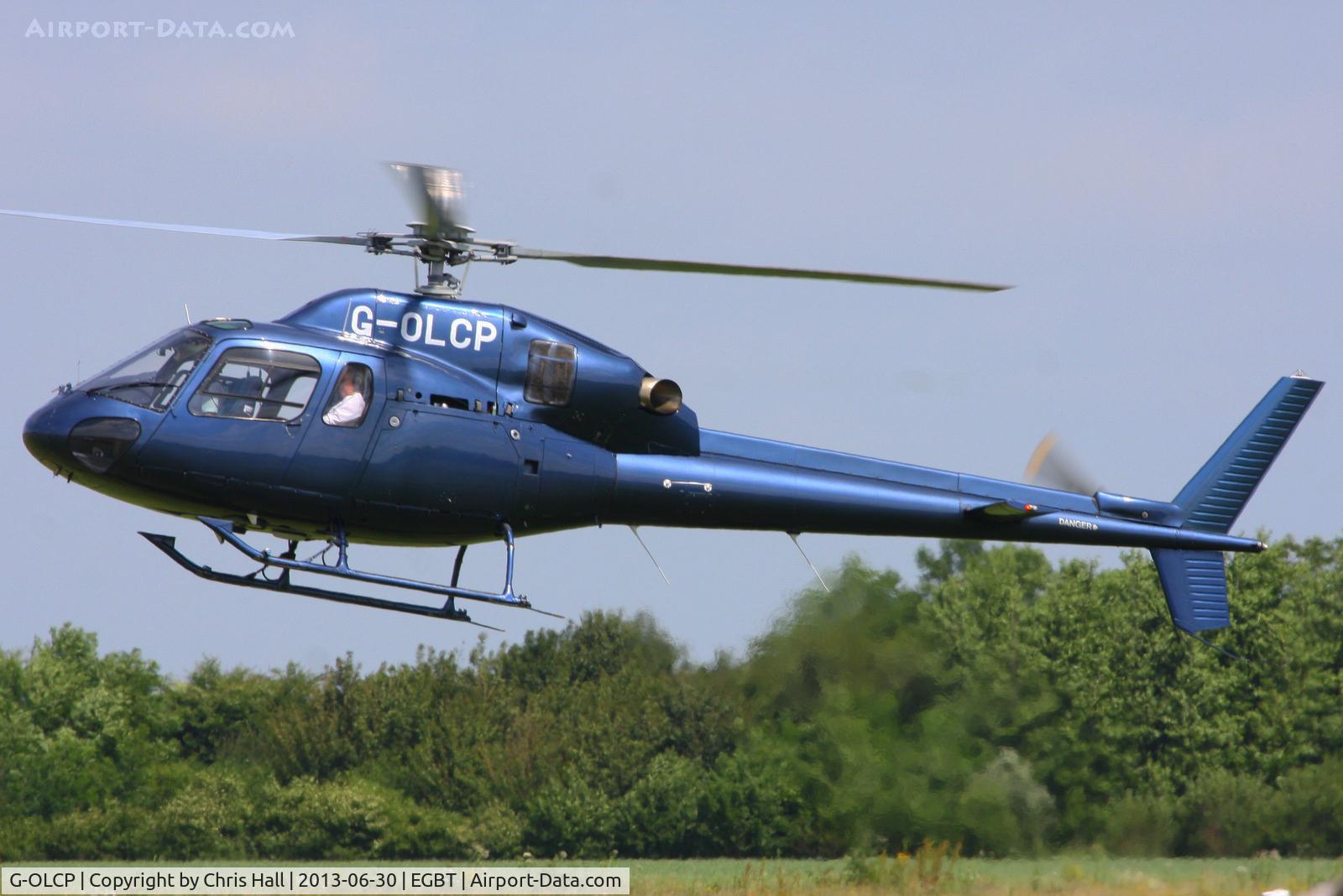G-OLCP, 1994 Eurocopter AS-355N Ecureuil 2 C/N 5580, being used for ferrying race fans to the British F1 Grand Prix at Silverstone