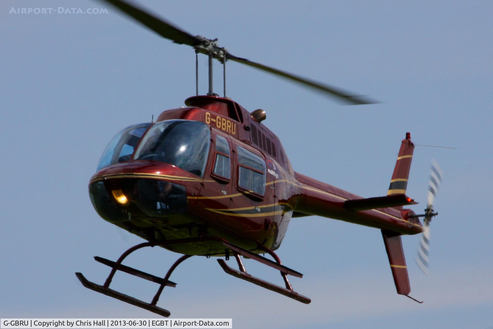 G-GBRU, 1987 Bell 206B JetRanger III C/N 3997, being used for ferrying race fans to the British F1 Grand Prix at Silverstone