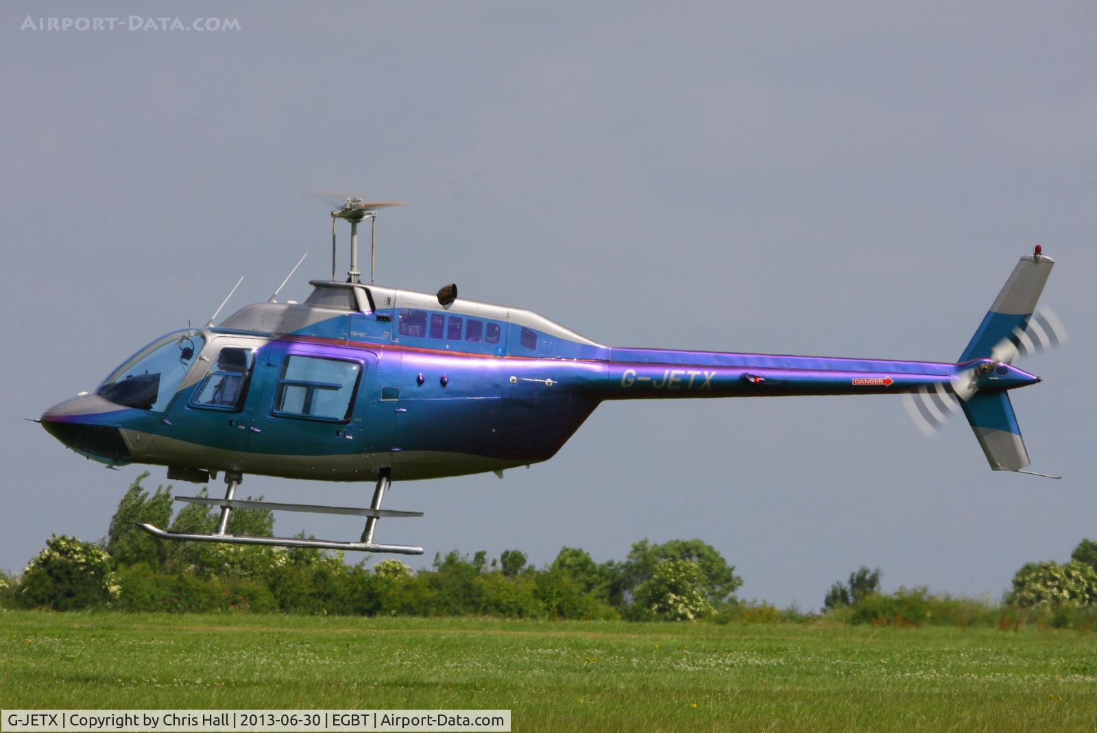 G-JETX, 1981 Bell 206B JetRanger III C/N 3208, being used for ferrying race fans to the British F1 Grand Prix at Silverstone