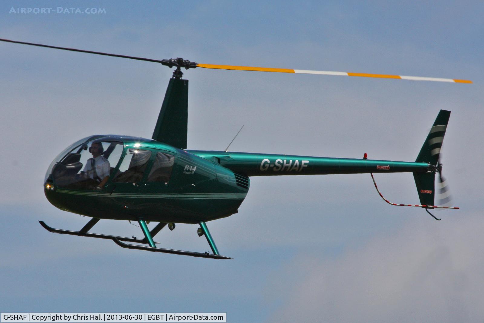 G-SHAF, 2005 Robinson R44 Raven II C/N 10892, being used for ferrying race fans to the British F1 Grand Prix at Silverstone