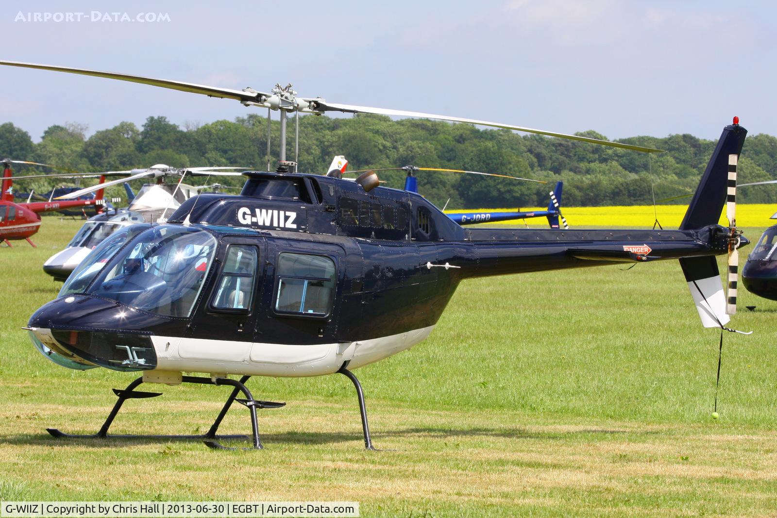 G-WIIZ, 1969 Agusta AB-206B JetRanger II C/N 8111, being used for ferrying race fans to the British F1 Grand Prix at Silverstone