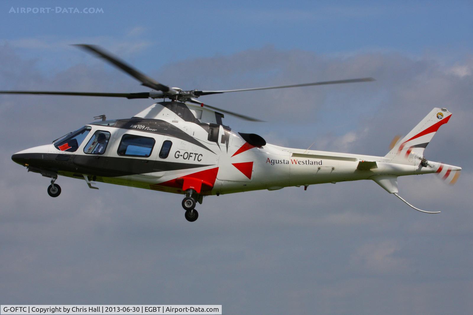 G-OFTC, 1999 Agusta A-109E Power C/N 11043, being used for ferrying race fans to the British F1 Grand Prix at Silverstone