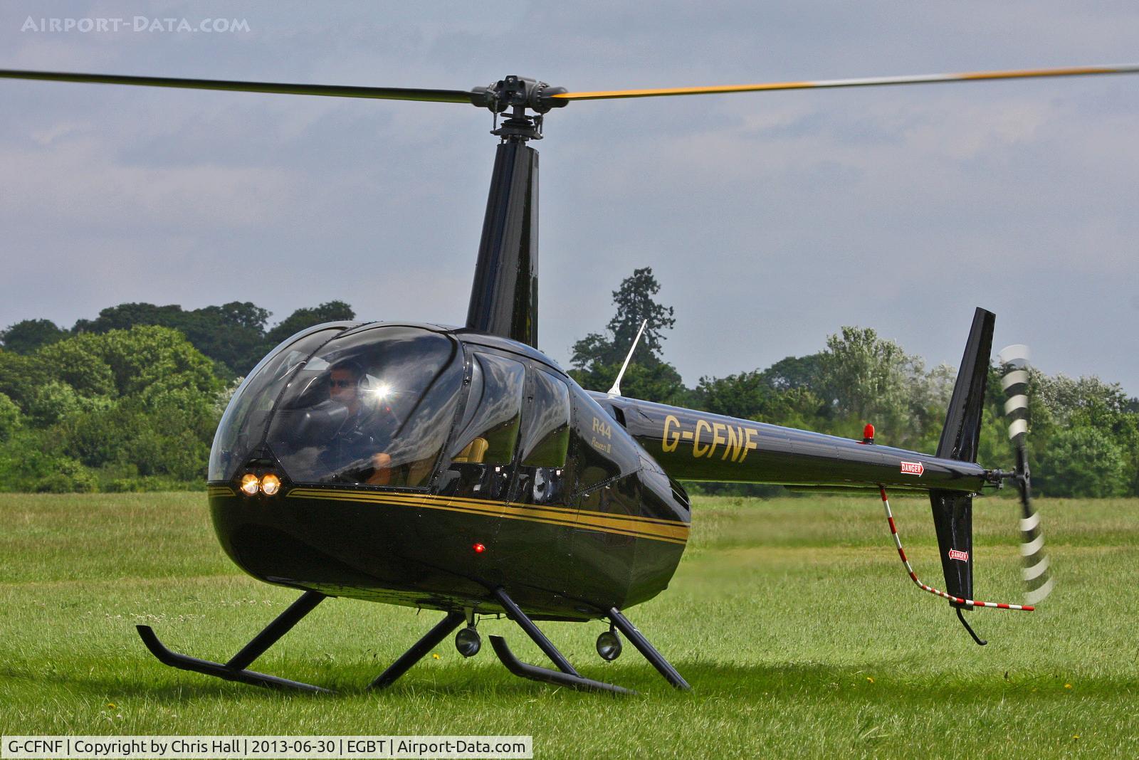 G-CFNF, 2008 Robinson R44 Raven II C/N 12496, being used for ferrying race fans to the British F1 Grand Prix at Silverstone