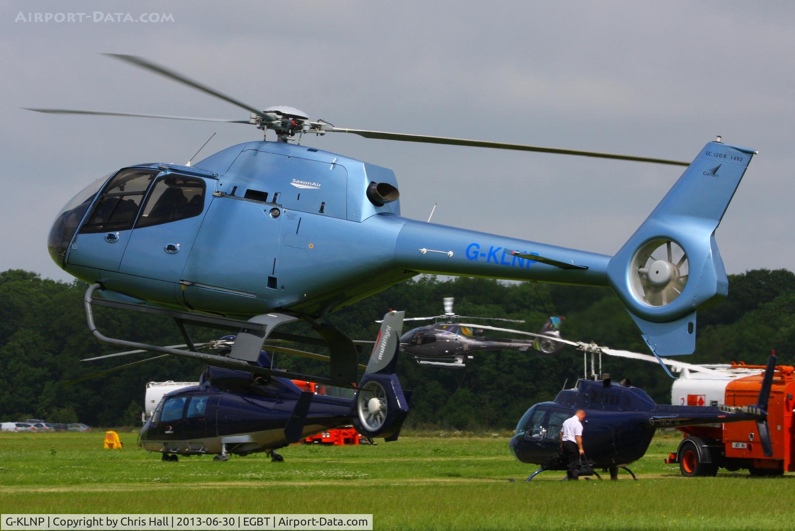 G-KLNP, 2007 Eurocopter EC-120B Colibri C/N 1492, being used for ferrying race fans to the British F1 Grand Prix at Silverstone