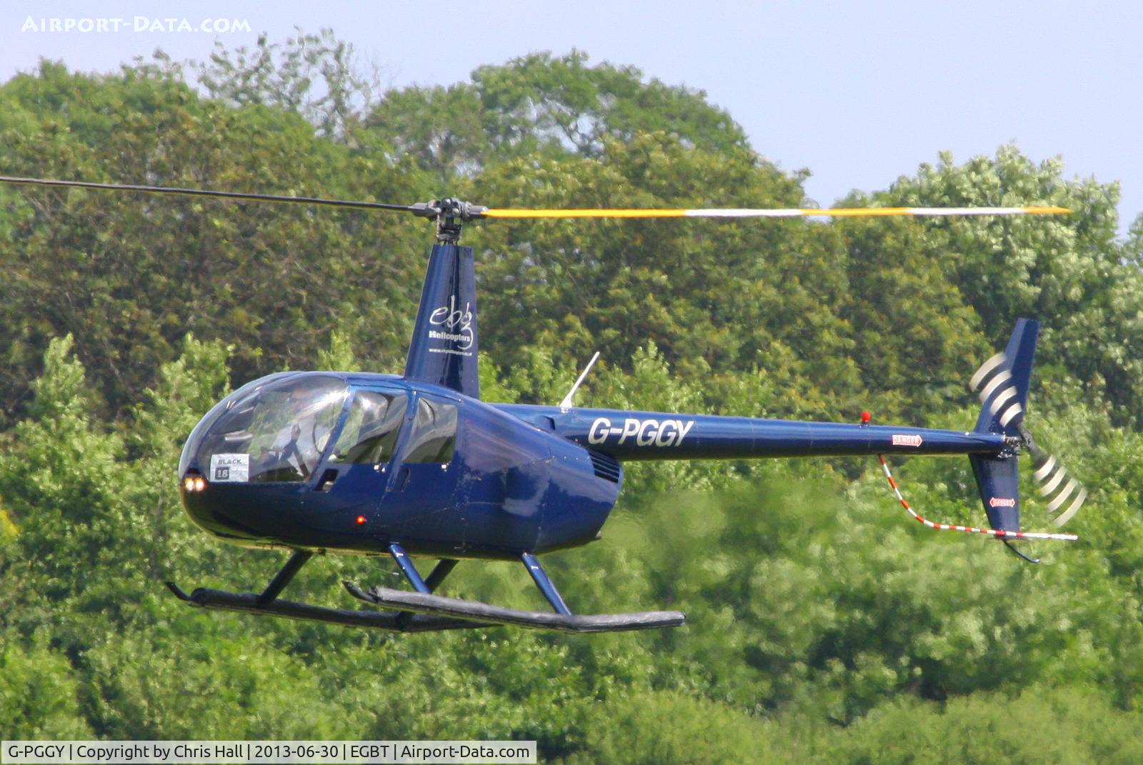 G-PGGY, 2006 Robinson R44 Clipper II C/N 11115, being used for ferrying race fans to the British F1 Grand Prix at Silverstone