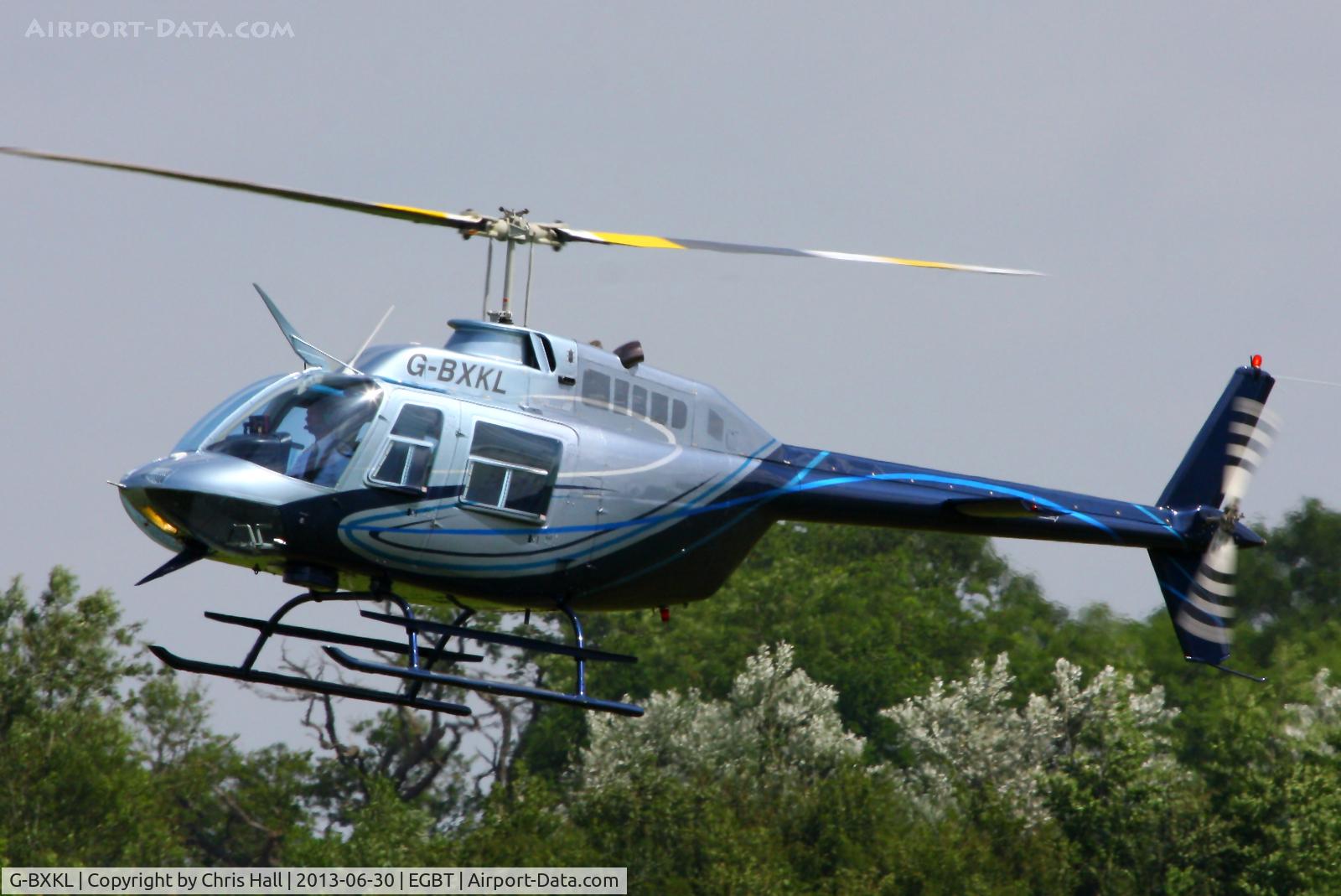 G-BXKL, 1980 Bell 206B JetRanger II C/N 3006, being used for ferrying race fans to the British F1 Grand Prix at Silverstone
