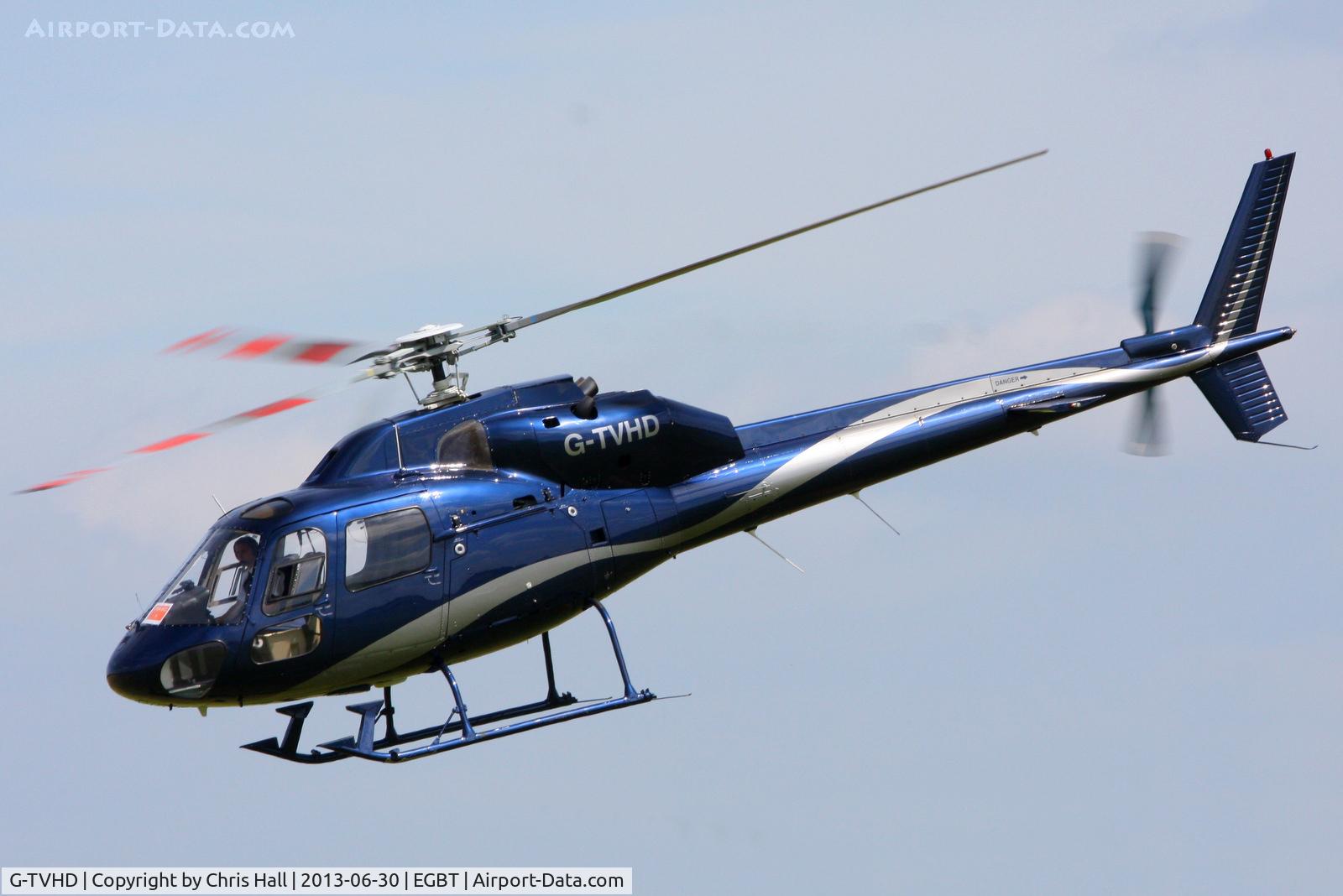 G-TVHD, 1990 Aerospatiale AS-355F-2 Ecureuil 2 C/N 5449, being used for ferrying race fans to the British F1 Grand Prix at Silverstone