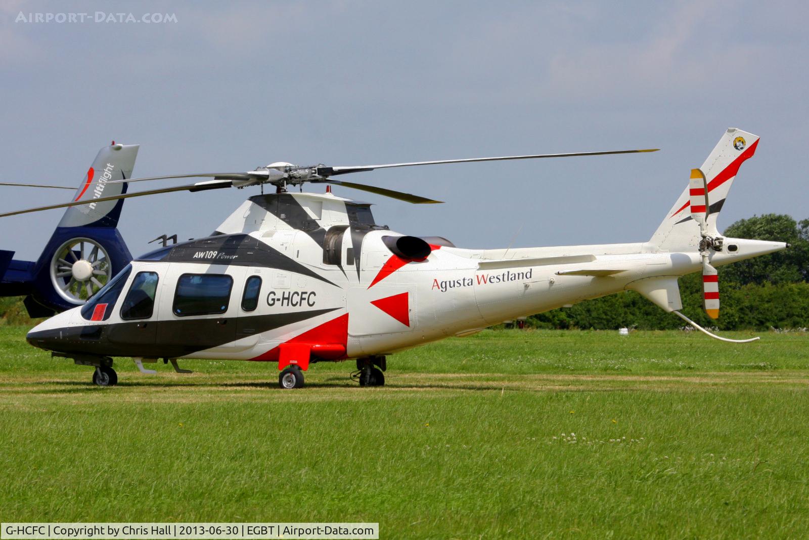 G-HCFC, 1997 Agusta A-109E Power C/N 11011, being used for ferrying race fans to the British F1 Grand Prix at Silverstone