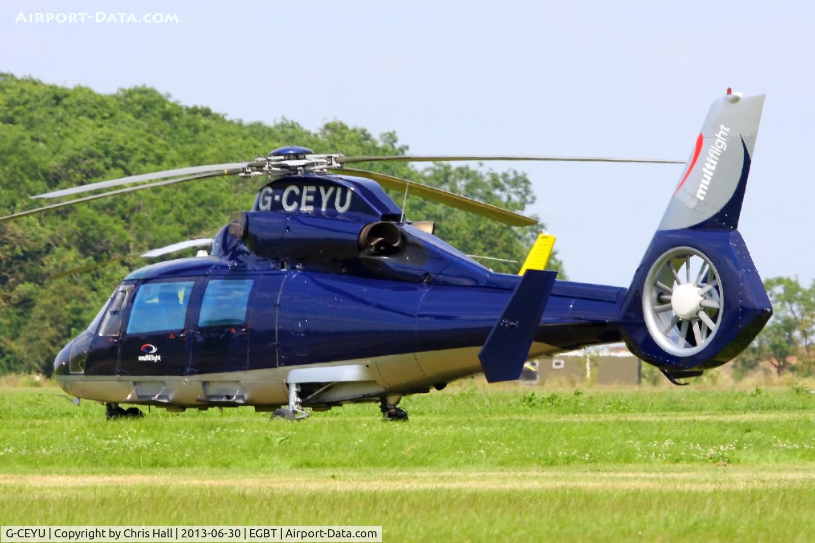 G-CEYU, 1988 Aerospatiale SA-365N-1 Dauphin 2 C/N 6298, being used for ferrying race fans to the British F1 Grand Prix at Silverstone