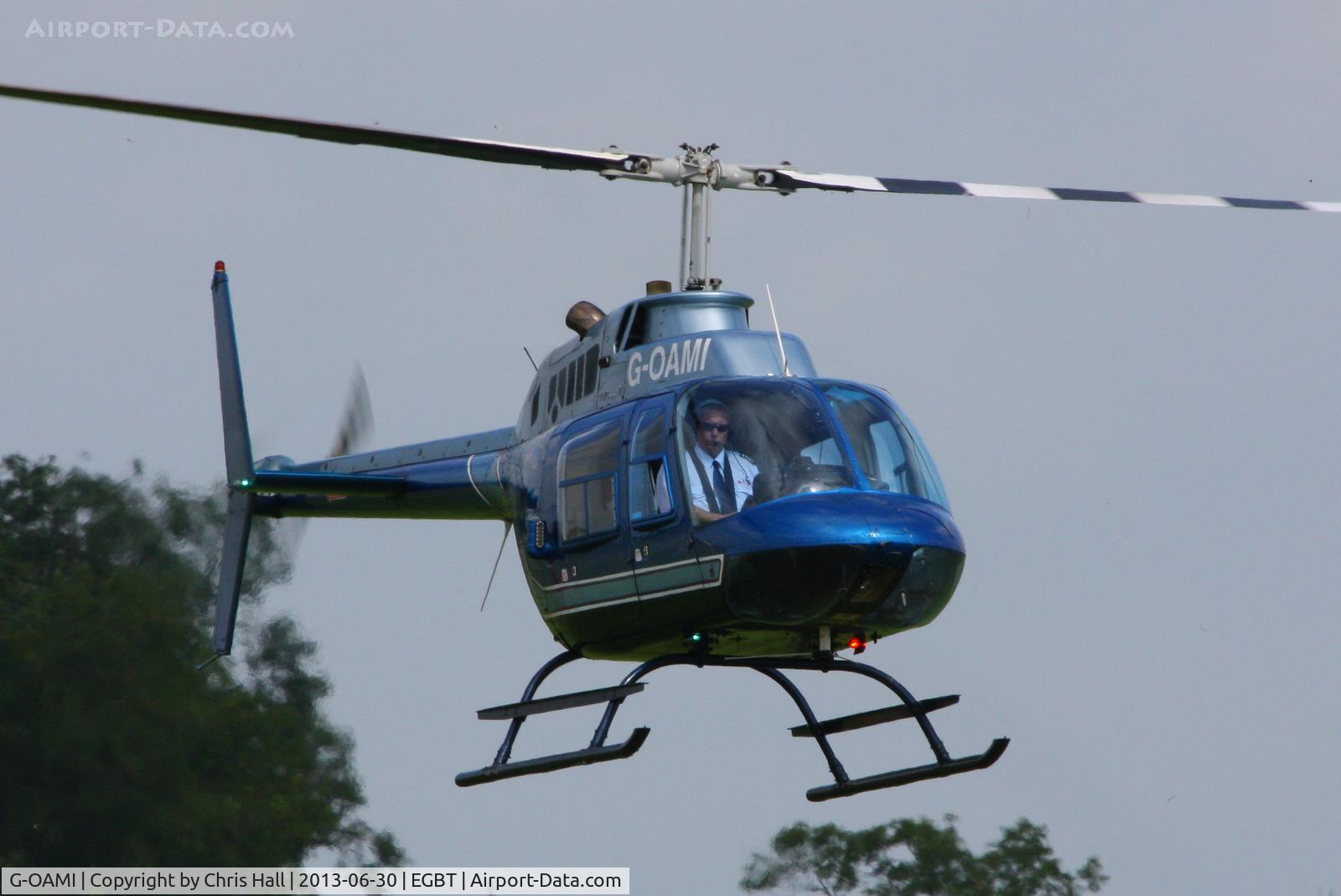 G-OAMI, 1968 Bell 206B JetRanger II C/N 464, being used for ferrying race fans to the British F1 Grand Prix at Silverstone