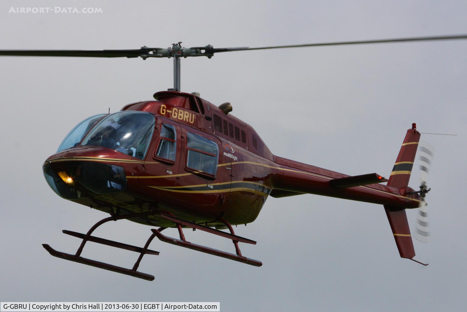 G-GBRU, 1987 Bell 206B JetRanger III C/N 3997, being used for ferrying race fans to the British F1 Grand Prix at Silverstone