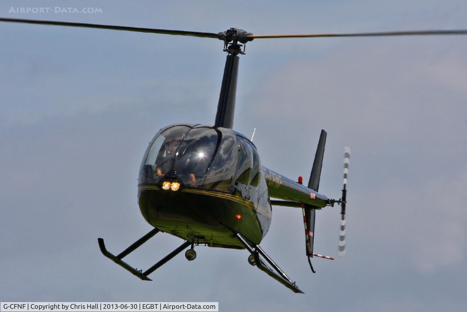 G-CFNF, 2008 Robinson R44 Raven II C/N 12496, being used for ferrying race fans to the British F1 Grand Prix at Silverstone