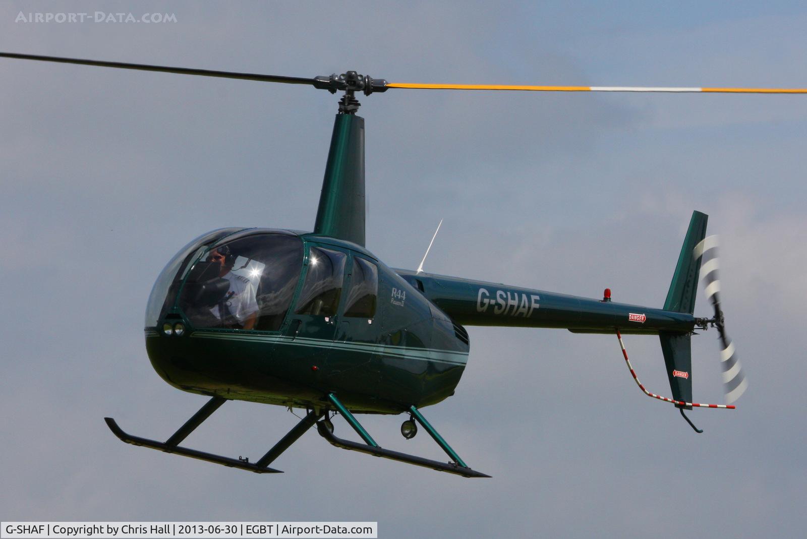 G-SHAF, 2005 Robinson R44 Raven II C/N 10892, being used for ferrying race fans to the British F1 Grand Prix at Silverstone