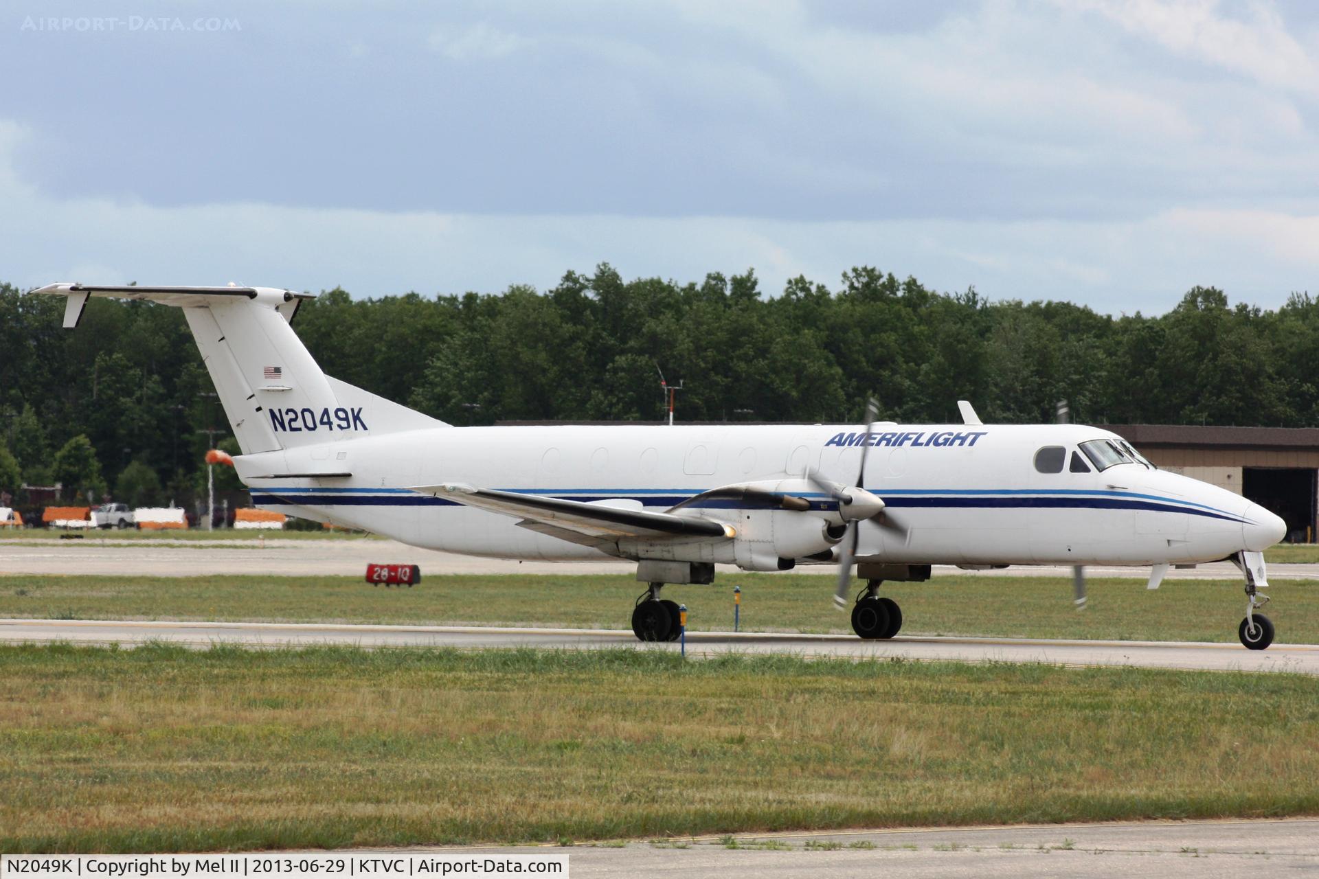 N2049K, 1991 Beech 1900C C/N UC-164, AMF1131 - KTVC-KLAN - Taxi For Departure RWY 10