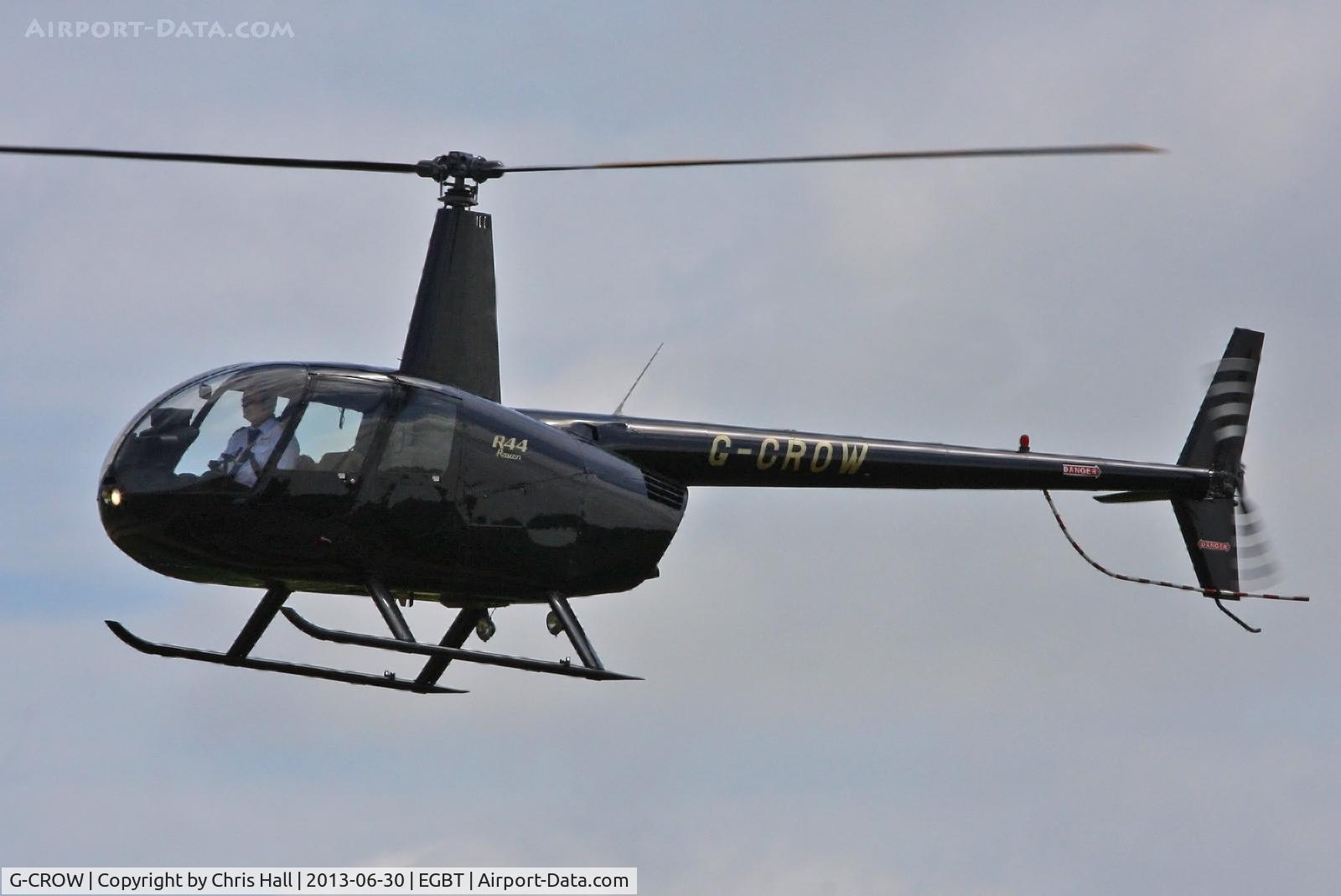 G-CROW, 2000 Robinson R44 Astro C/N 0754, being used for ferrying race fans to the British F1 Grand Prix at Silverstone