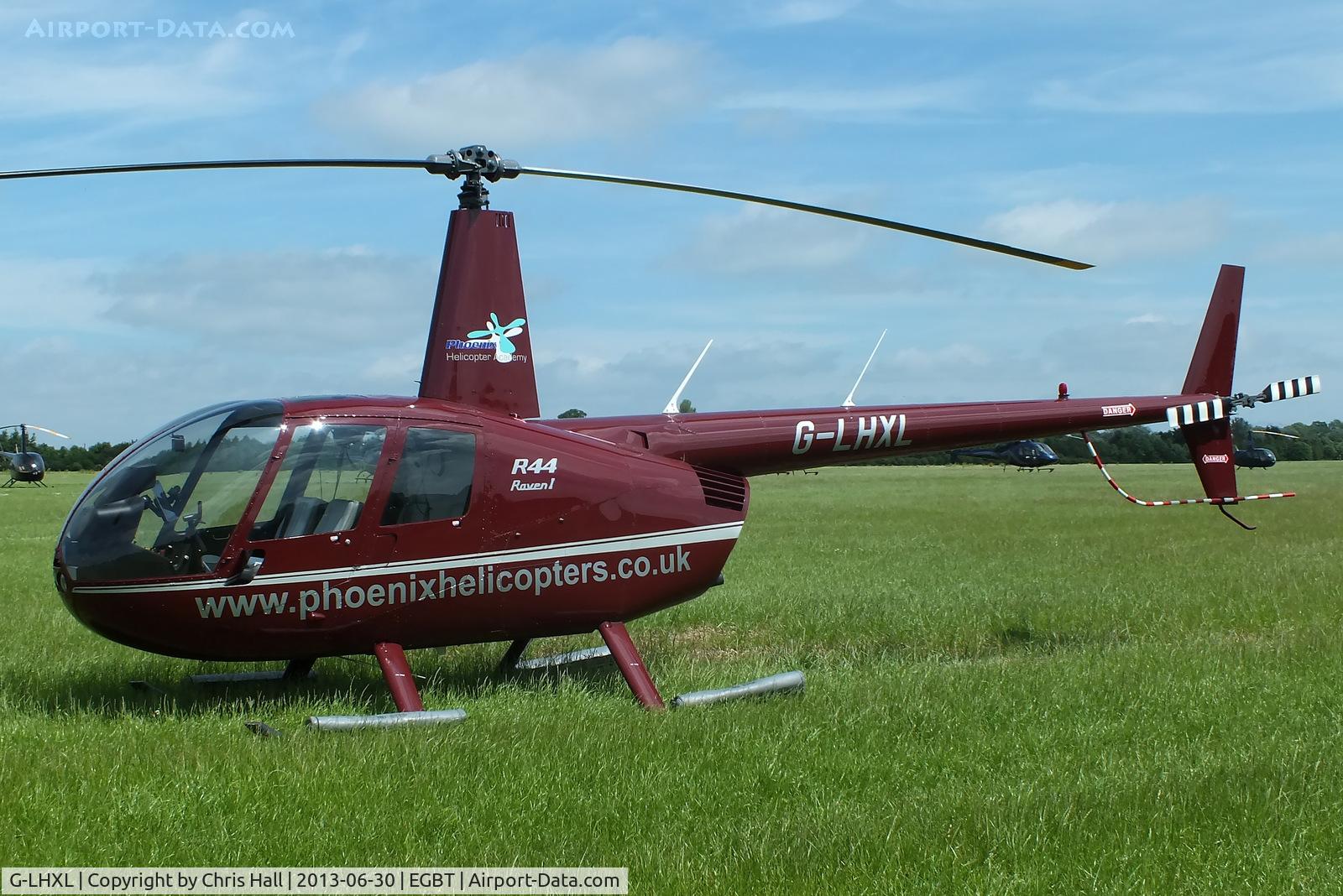 G-LHXL, 2007 Robinson R44 Raven C/N 1702, being used for ferrying race fans to the British F1 Grand Prix at Silverstone