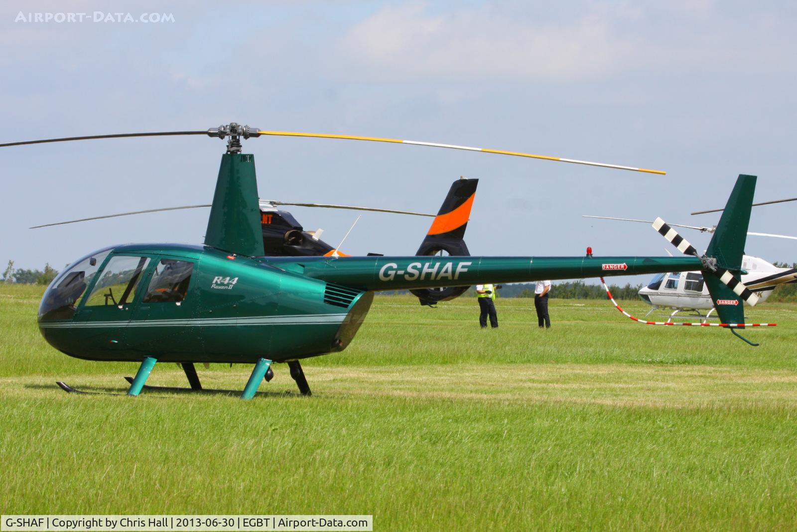 G-SHAF, 2005 Robinson R44 Raven II C/N 10892, being used for ferrying race fans to the British F1 Grand Prix at Silverstone
