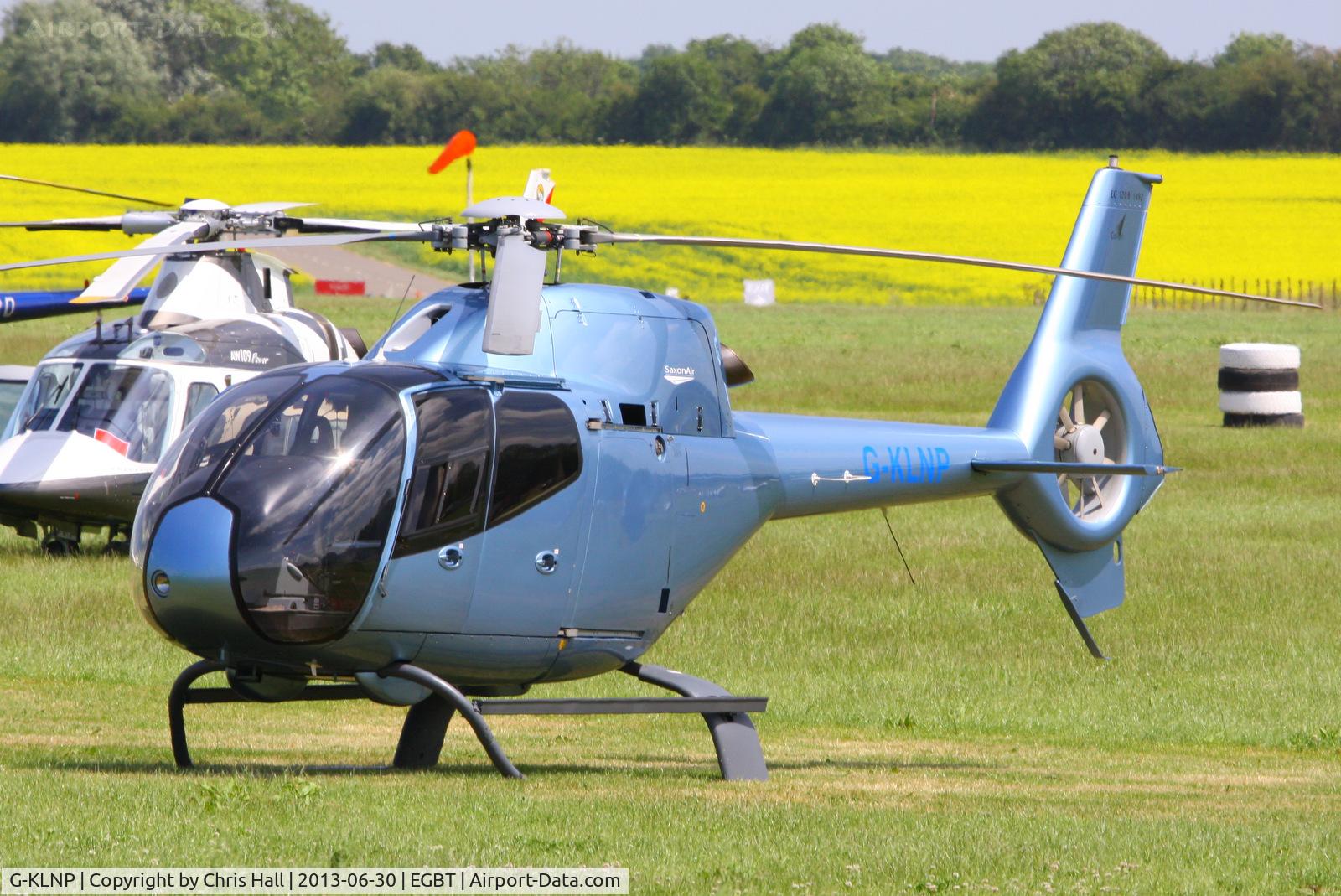 G-KLNP, 2007 Eurocopter EC-120B Colibri C/N 1492, being used for ferrying race fans to the British F1 Grand Prix at Silverstone
