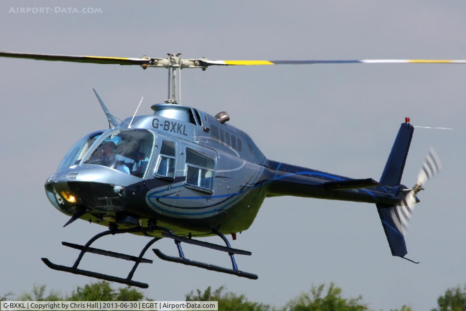 G-BXKL, 1980 Bell 206B JetRanger II C/N 3006, being used for ferrying race fans to the British F1 Grand Prix at Silverstone