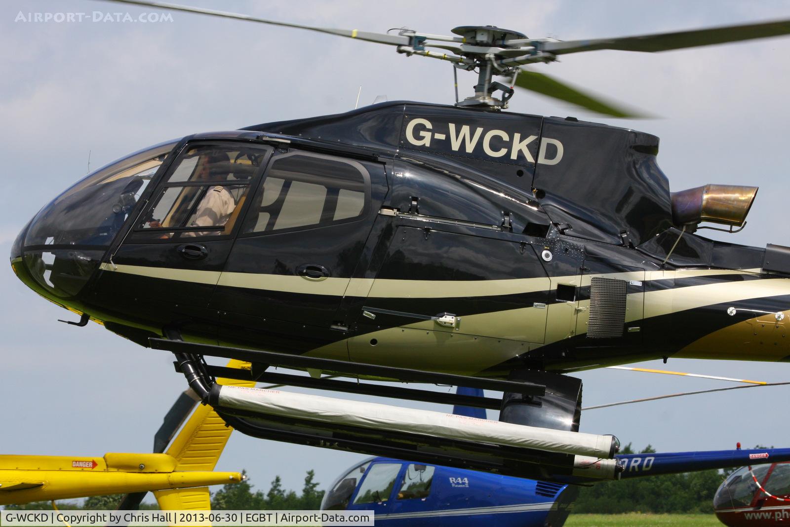 G-WCKD, 2009 Eurocopter EC-130B-4 (AS-350B-4) C/N 4746, being used for ferrying race fans to the British F1 Grand Prix at Silverstone