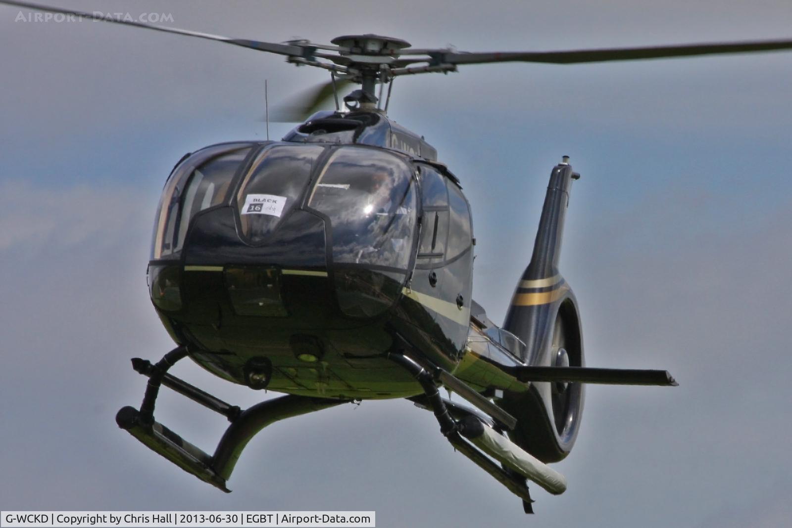 G-WCKD, 2009 Eurocopter EC-130B-4 (AS-350B-4) C/N 4746, being used for ferrying race fans to the British F1 Grand Prix at Silverstone