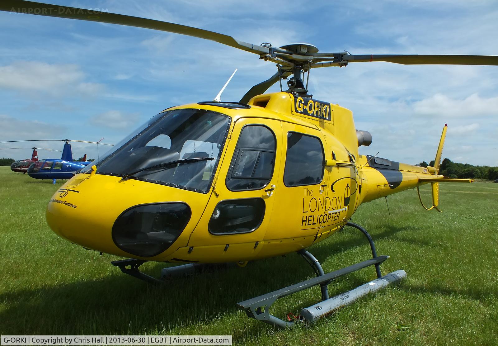 G-ORKI, 2002 Eurocopter AS-350B-3 Ecureuil Ecureuil C/N 3587, being used for ferrying race fans to the British F1 Grand Prix at Silverstone