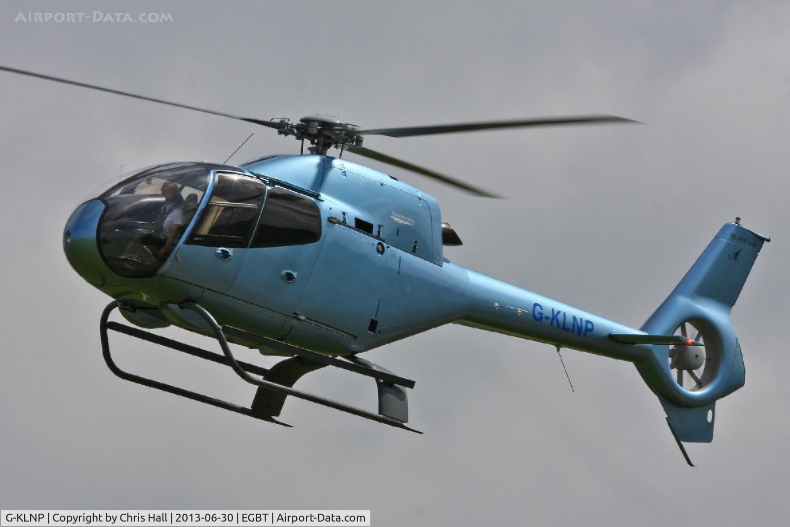 G-KLNP, 2007 Eurocopter EC-120B Colibri C/N 1492, being used for ferrying race fans to the British F1 Grand Prix at Silverstone