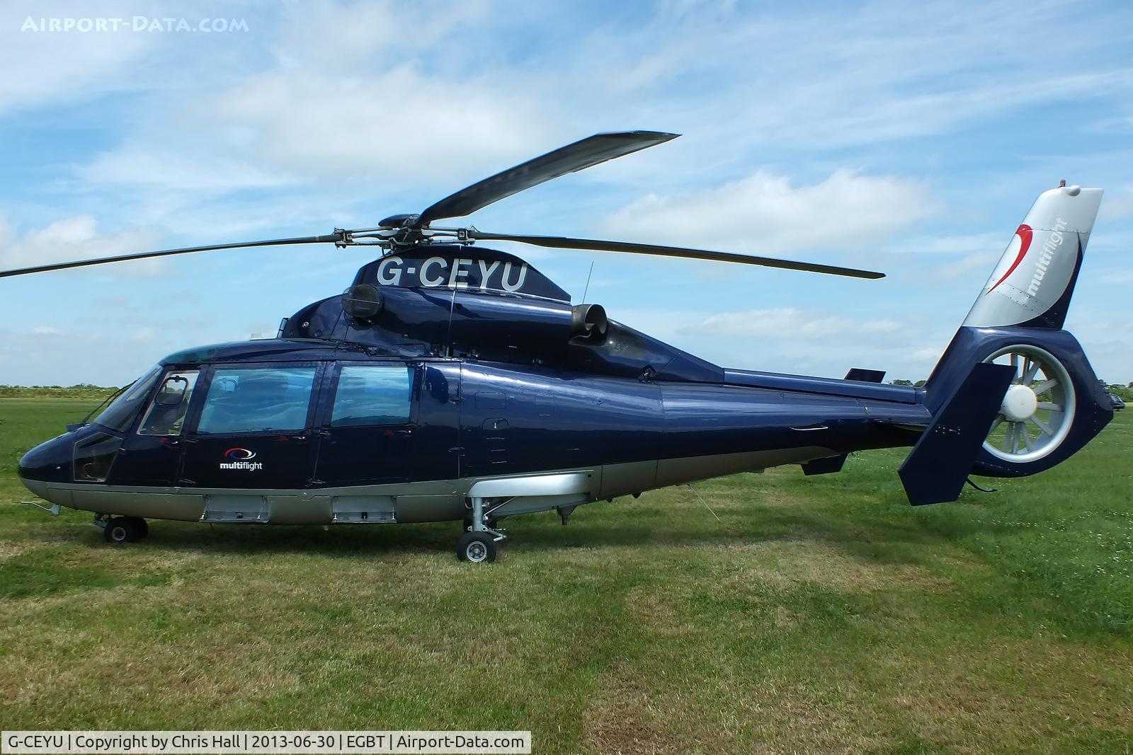 G-CEYU, 1988 Aerospatiale SA-365N-1 Dauphin 2 C/N 6298, being used for ferrying race fans to the British F1 Grand Prix at Silverstone