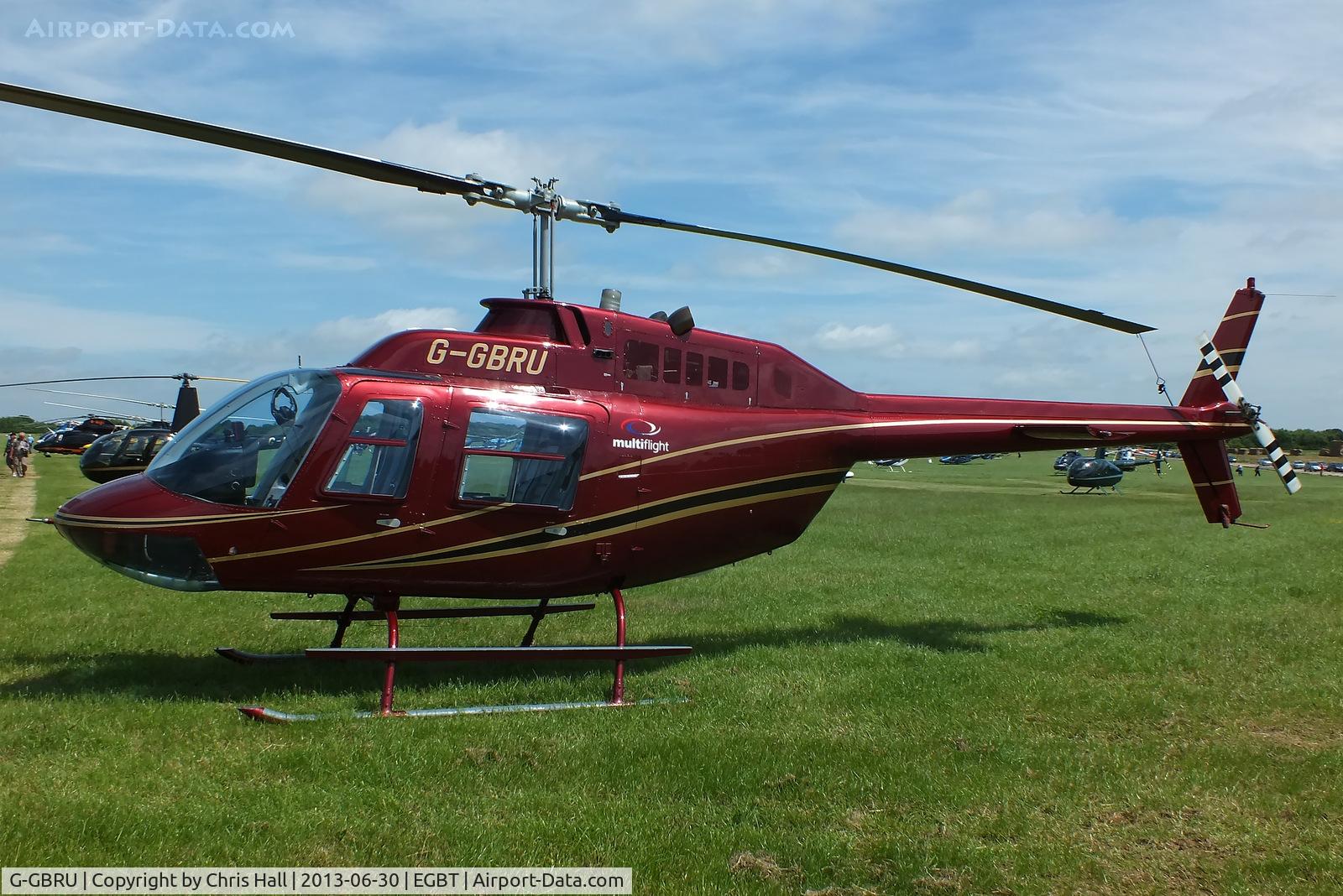G-GBRU, 1987 Bell 206B JetRanger III C/N 3997, being used for ferrying race fans to the British F1 Grand Prix at Silverstone