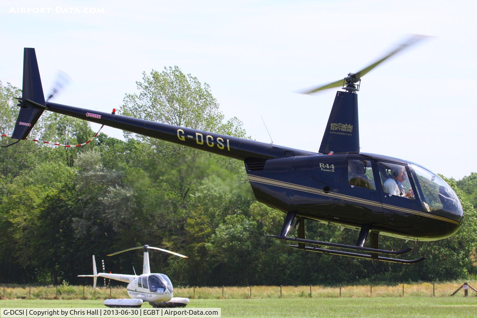 G-DCSI, 2007 Robinson R44 Raven II C/N 11746, being used for ferrying race fans to the British F1 Grand Prix at Silverstone