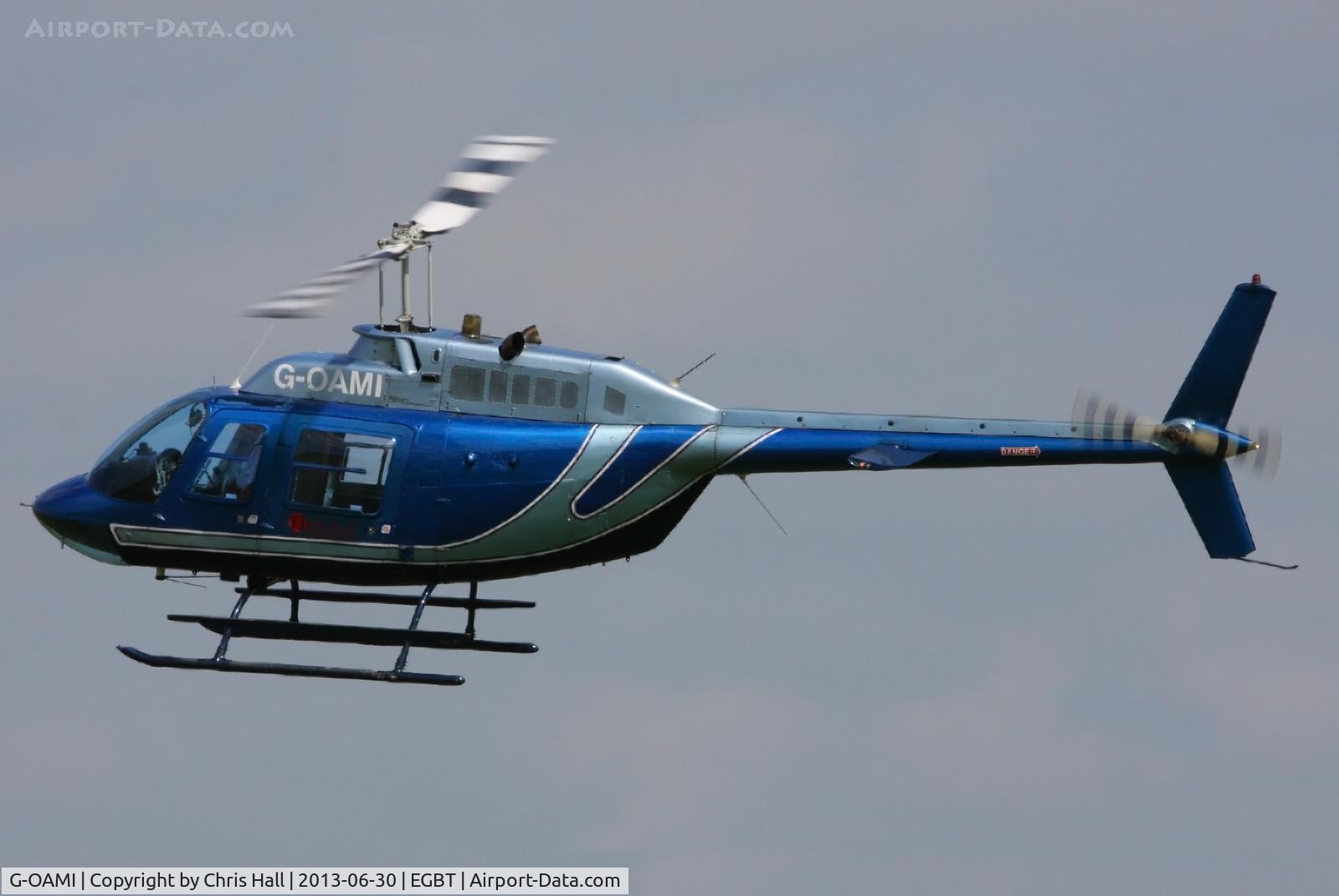 G-OAMI, 1968 Bell 206B JetRanger II C/N 464, being used for ferrying race fans to the British F1 Grand Prix at Silverstone