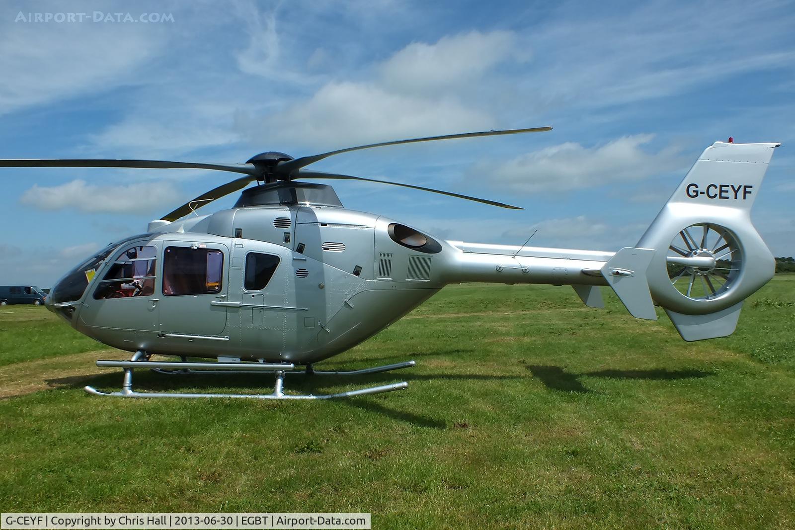 G-CEYF, 1999 Eurocopter EC-135T-1 C/N 0115, being used for ferrying race fans to the British F1 Grand Prix at Silverstone