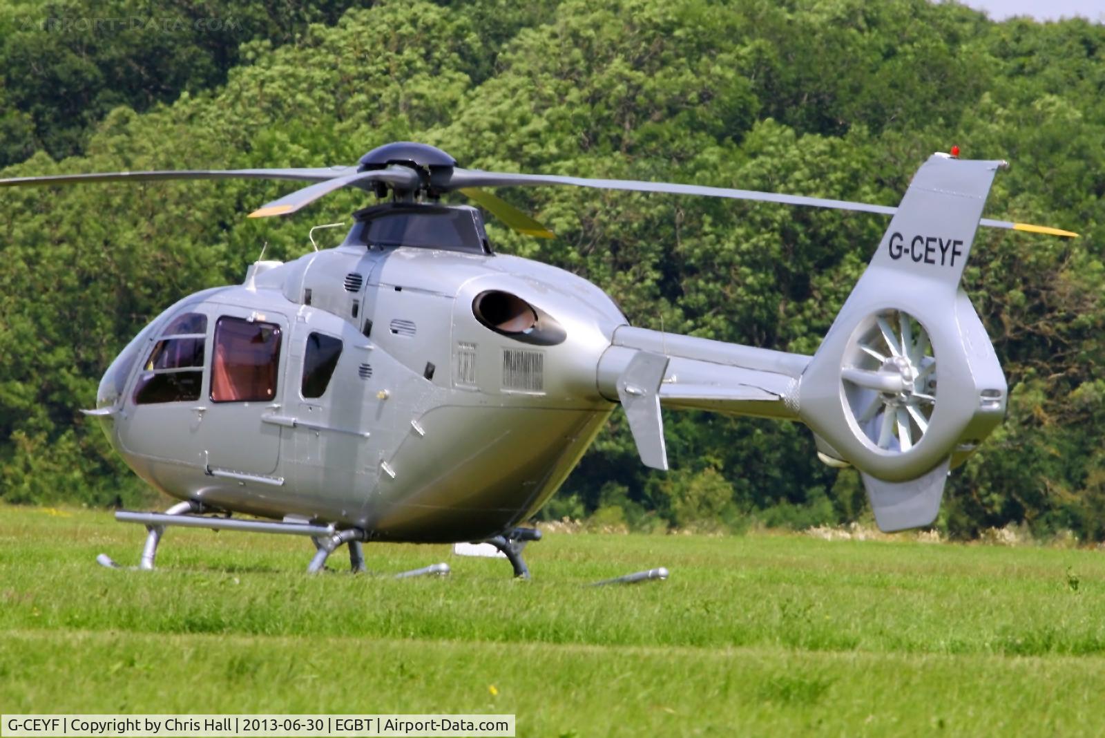 G-CEYF, 1999 Eurocopter EC-135T-1 C/N 0115, being used for ferrying race fans to the British F1 Grand Prix at Silverstone