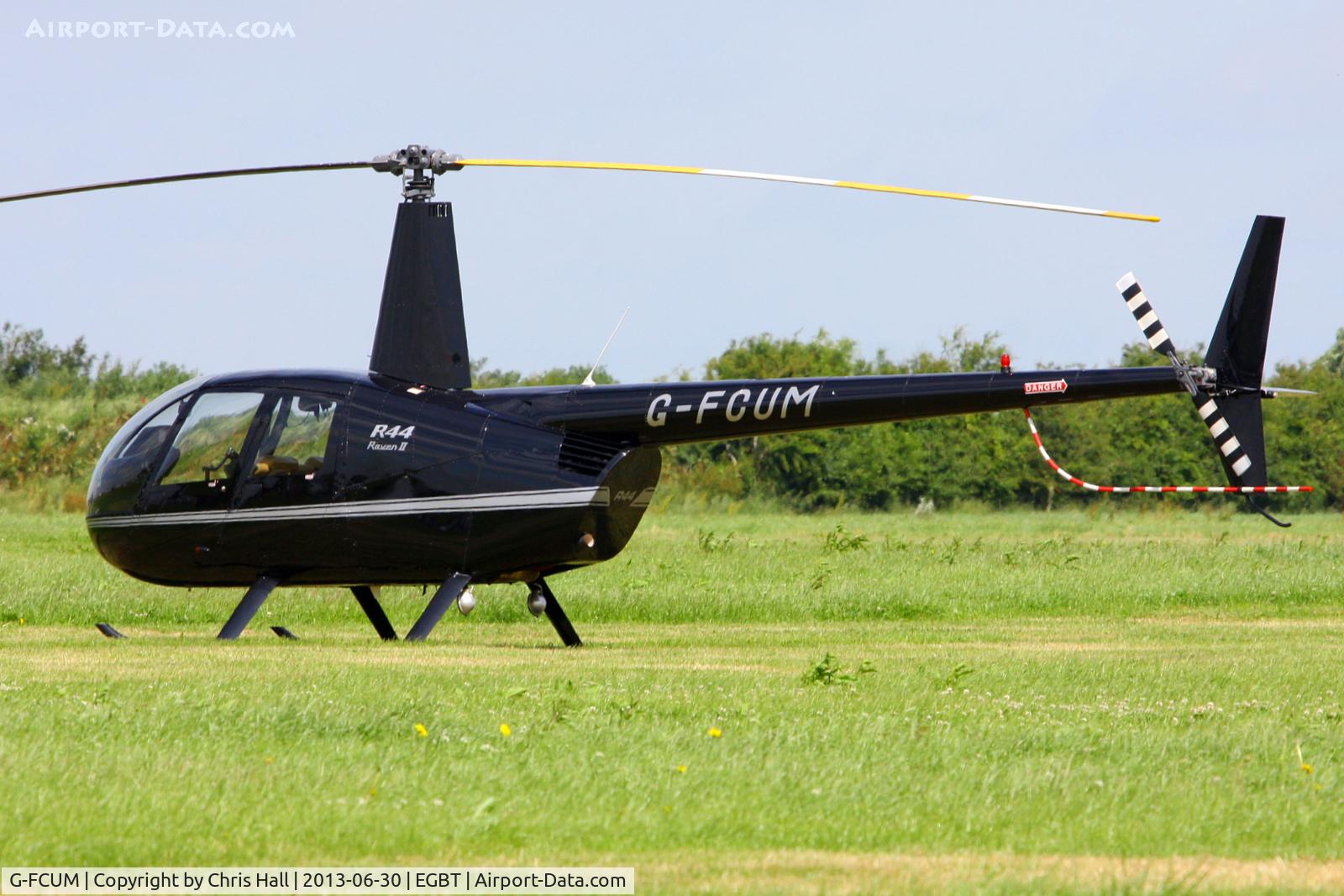 G-FCUM, 2007 Robinson R44 Raven II C/N 11723, being used for ferrying race fans to the British F1 Grand Prix at Silverstone