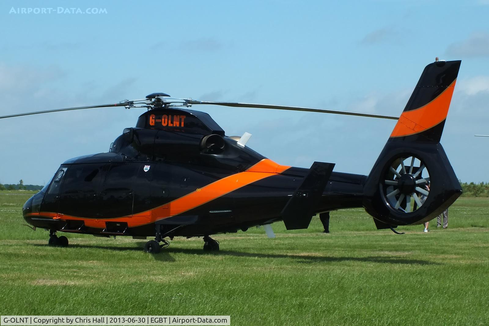 G-OLNT, 1988 Aérospatiale SA-365N-1 Dauphin 2 C/N 6309, being used for ferrying race fans to the British F1 Grand Prix at Silverstone