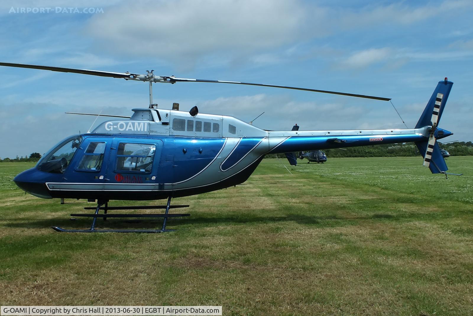 G-OAMI, 1968 Bell 206B JetRanger II C/N 464, being used for ferrying race fans to the British F1 Grand Prix at Silverstone