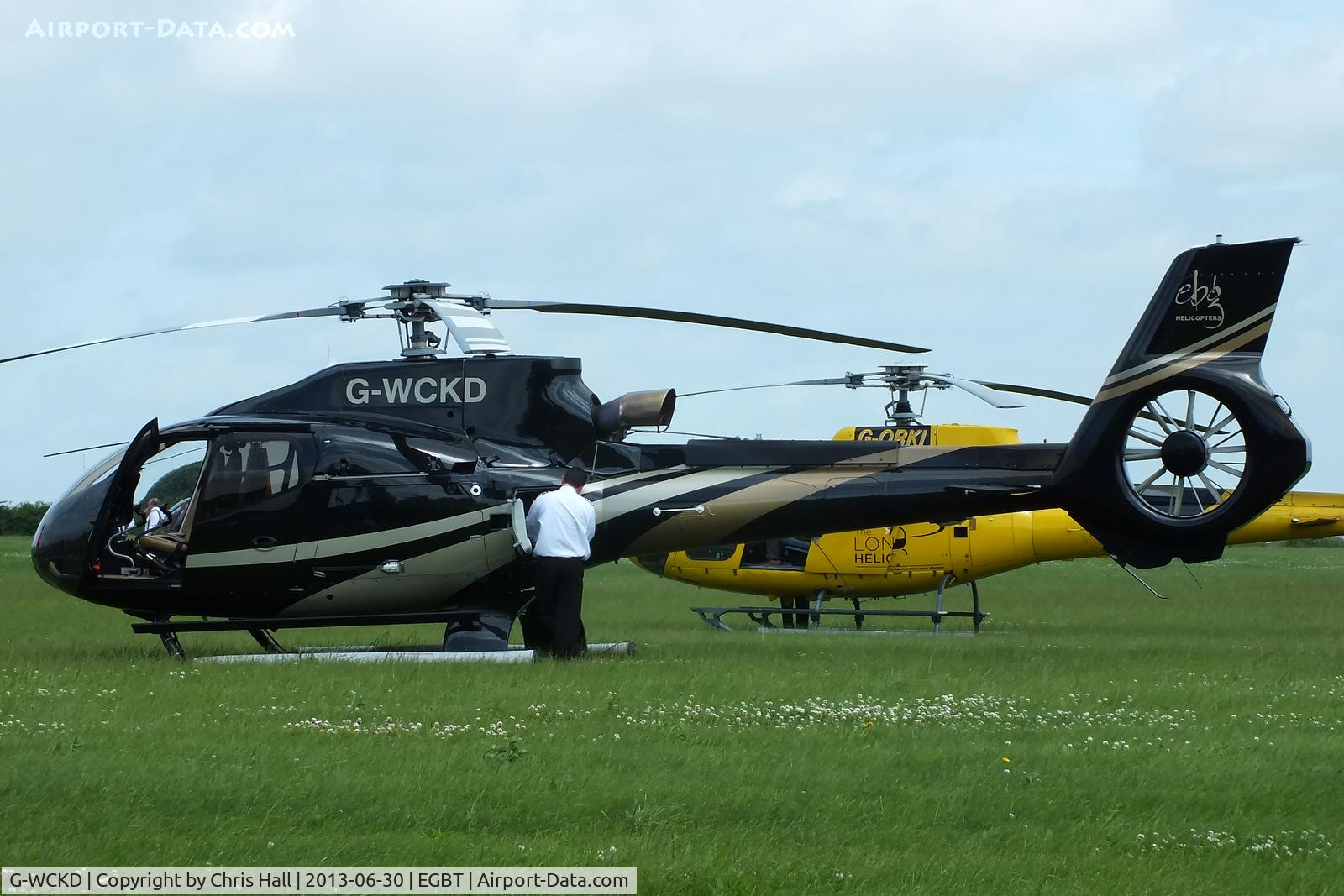 G-WCKD, 2009 Eurocopter EC-130B-4 (AS-350B-4) C/N 4746, being used for ferrying race fans to the British F1 Grand Prix at Silverstone