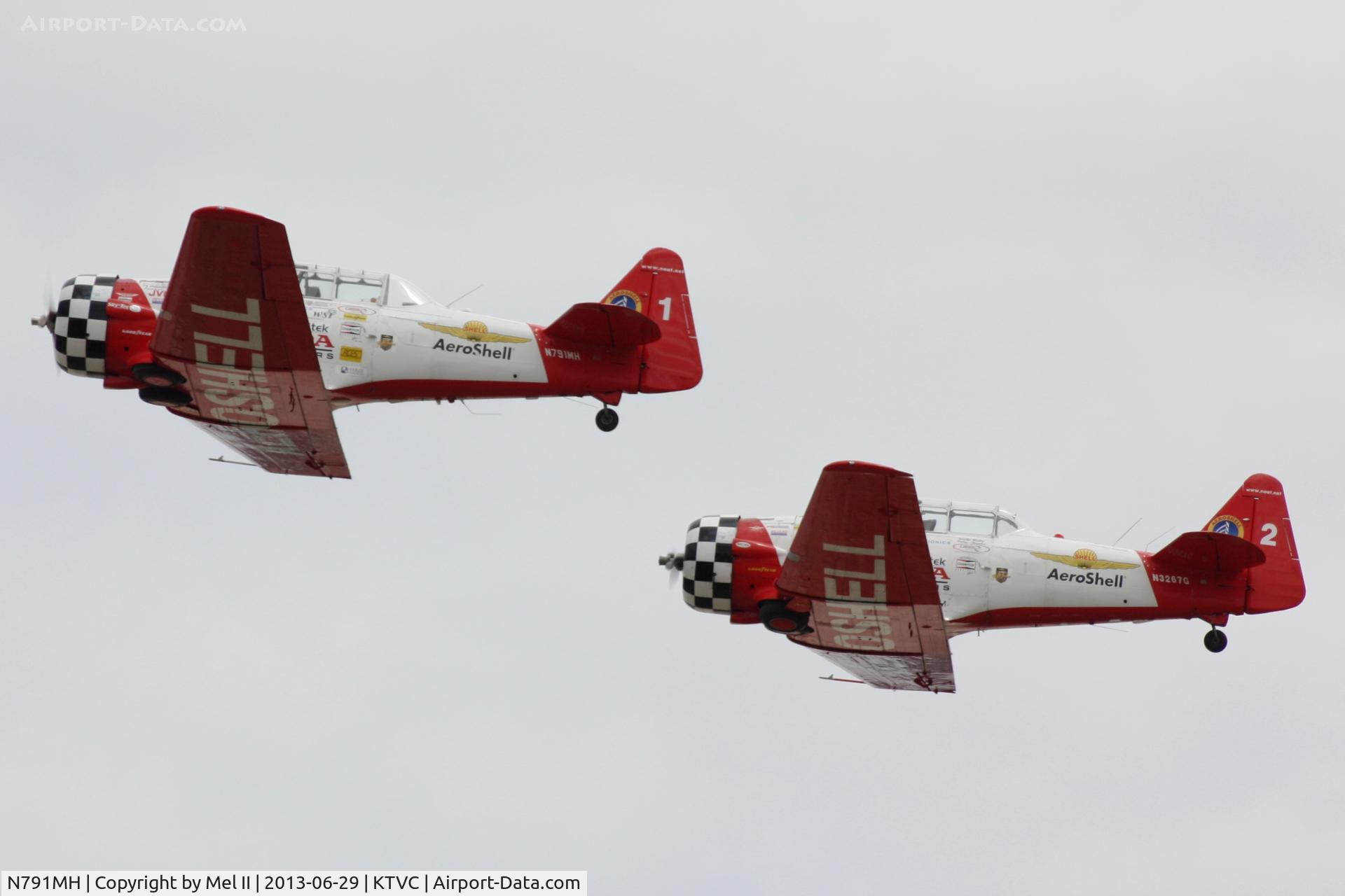 N791MH, 1951 North American T-6G Texan C/N 182-478, With N3267G Departing RWY 36