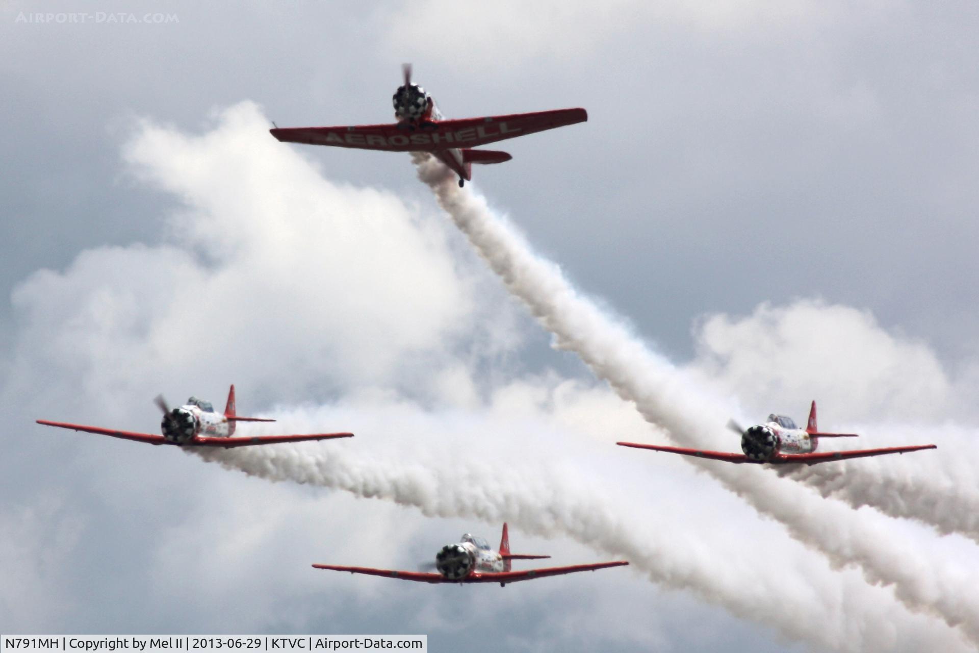 N791MH, 1951 North American T-6G Texan C/N 182-478, With N3267G, N7462C and N991GM In the Overhead Approach For RWY 36