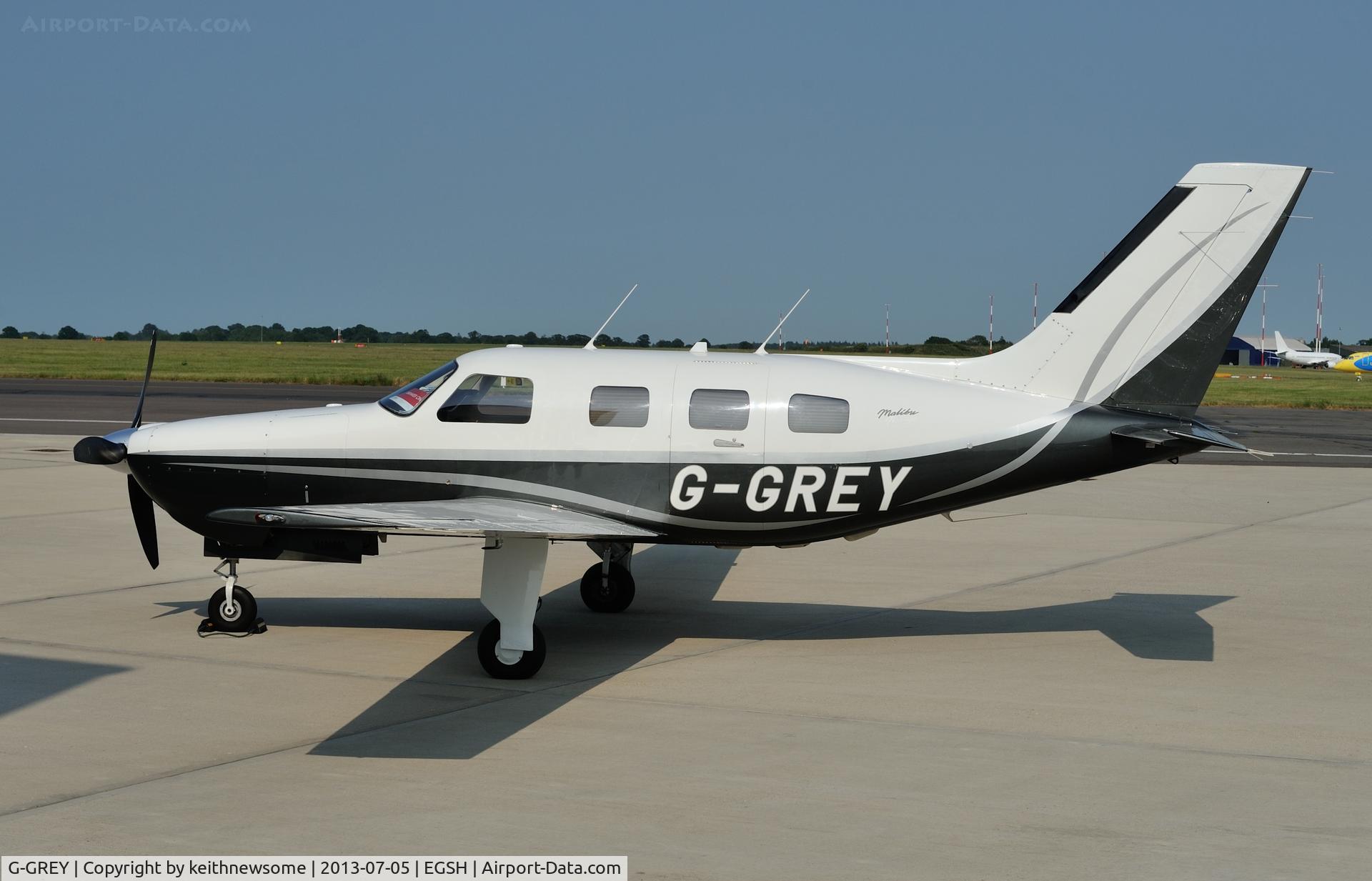 G-GREY, 1998 Piper PA-46-350P Malibu Mirage C/N 4636155, Sitting in the sun !