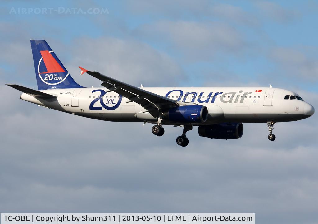 TC-OBE, 1995 Airbus A320-232 C/N 0471, Landing rwy 31R with additional 20th anniversary titles