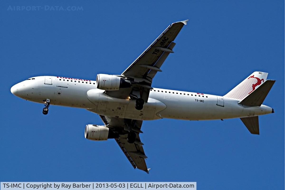 TS-IMC, 1990 Airbus A320-211 C/N 0124, Airbus A320-211 [0124] (Tunisair] Home~G 03/05/2013. On approach 27L now minus 7 November titles below the cockpit.
