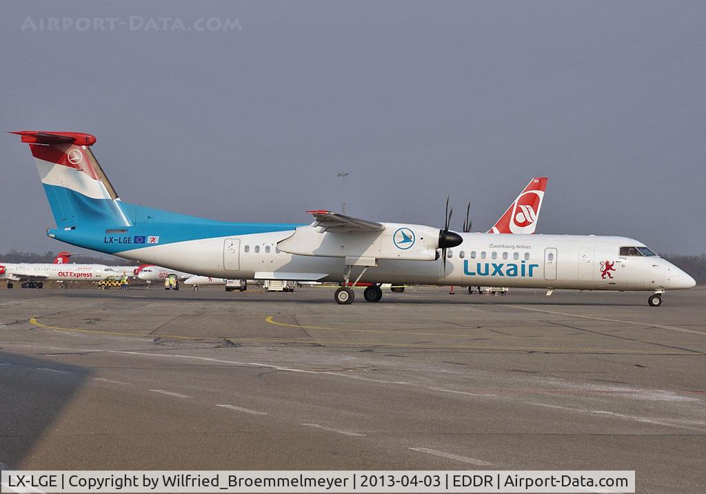 LX-LGE, 2009 De Havilland Canada DHC-8-402Q Dash 8 C/N 4284, Taxiing out to runway 09 via taxiways 