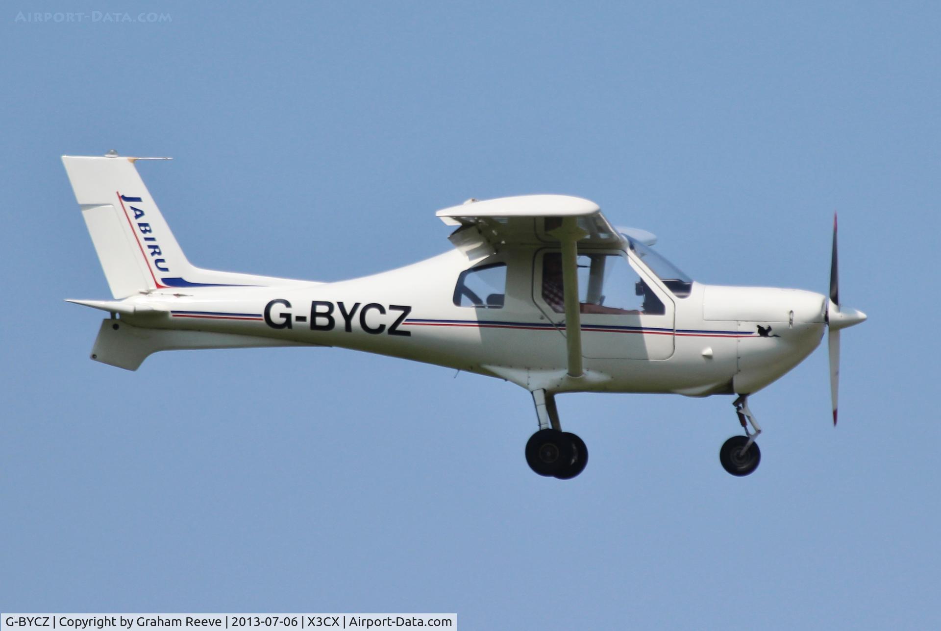 G-BYCZ, 1998 Jabiru SK C/N PFA 274-13388, About to touch down at Northrepps.