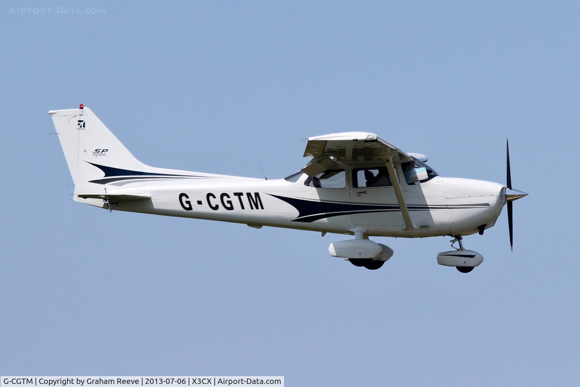 G-CGTM, 2004 Cessna 172S Skyhawk SP C/N 172S9597, About to touch down at Northrepps.