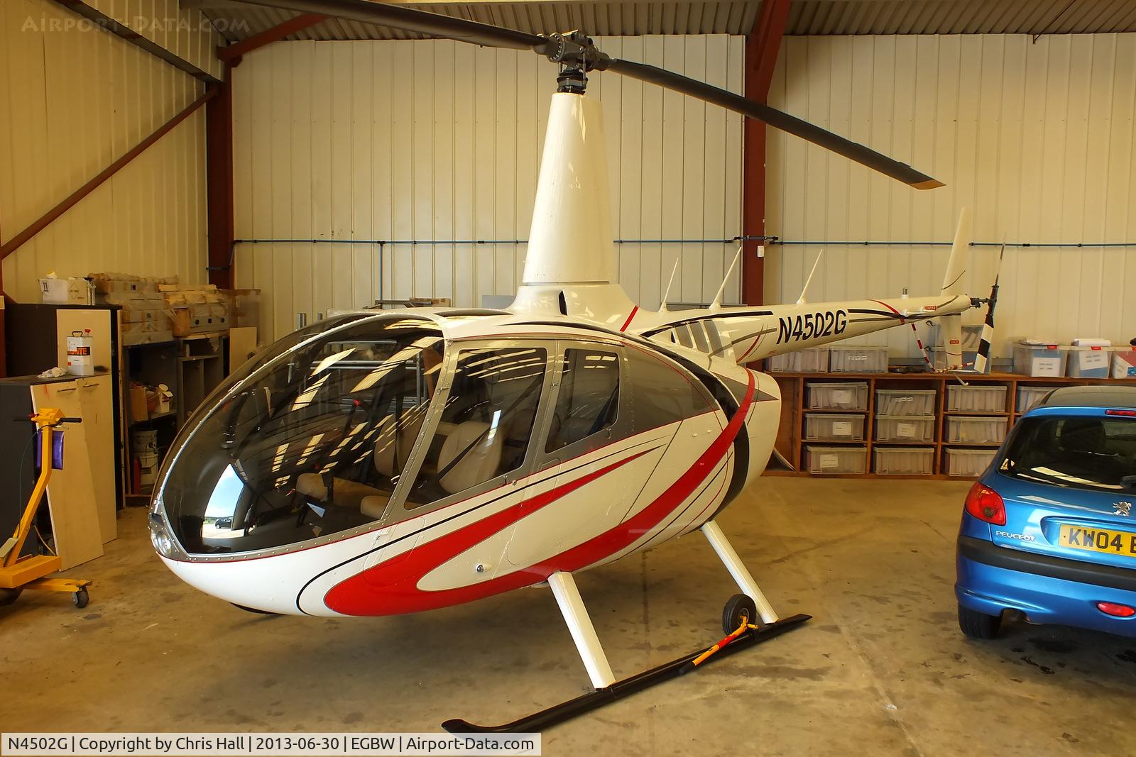 N4502G, 2011 Robinson R66 Turbine C/N 0059, inside the Heliair hangar